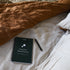 Image of gut reset journal on bed